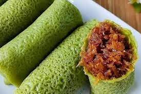 Nikmati Sensasi Dari Manisnya Kue Dadar Gulung, Campuran Isian Kelapa yang Lezat