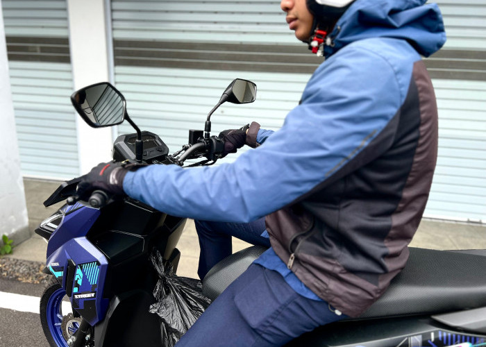 Jangan Menggantungkan Barang pada Kemudi Sepeda Motor